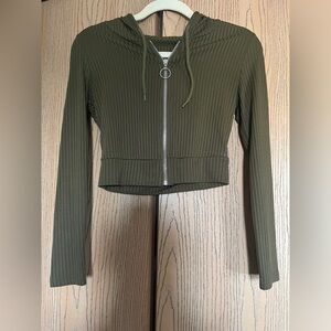 Woman’s ribknit O-ring, zipper drawstring, hoodie, and leggings